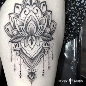 tatuaje mandala flor de loto en pierna infierno tatuajes