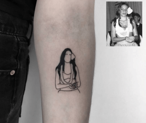 Tatuaje minimalista de silueta en antebrazo