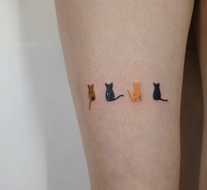 tatuaje de gatos pequeños
